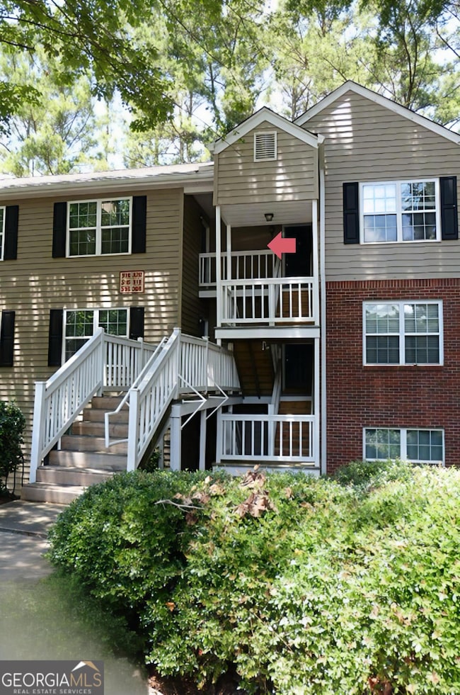 Easy access yet private entrance to this top-floor home, offering both convenience and seclusion.