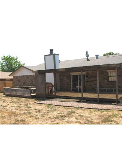 Exterior Back. Large open and covered deck