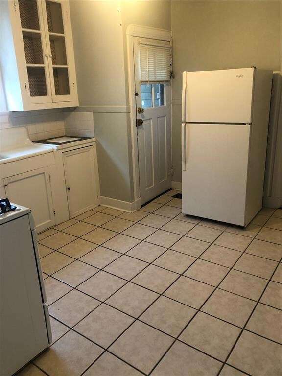 Original cabinetry and sink area. Freshly painted 
