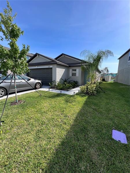 31289 Barrel Wave Way, Wesley Chapel, FL 33545 - photo 2