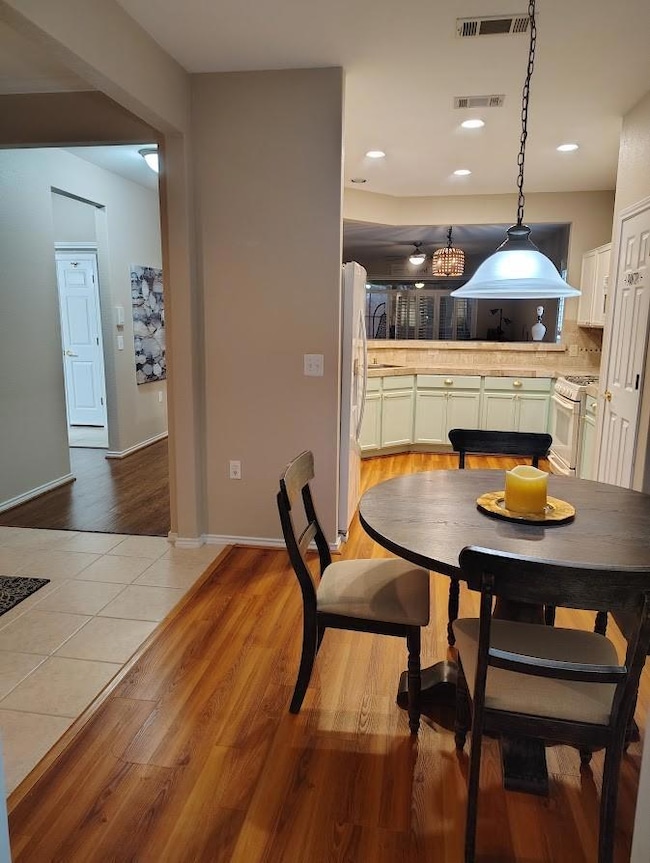 Entrance, dining, kitchen. 