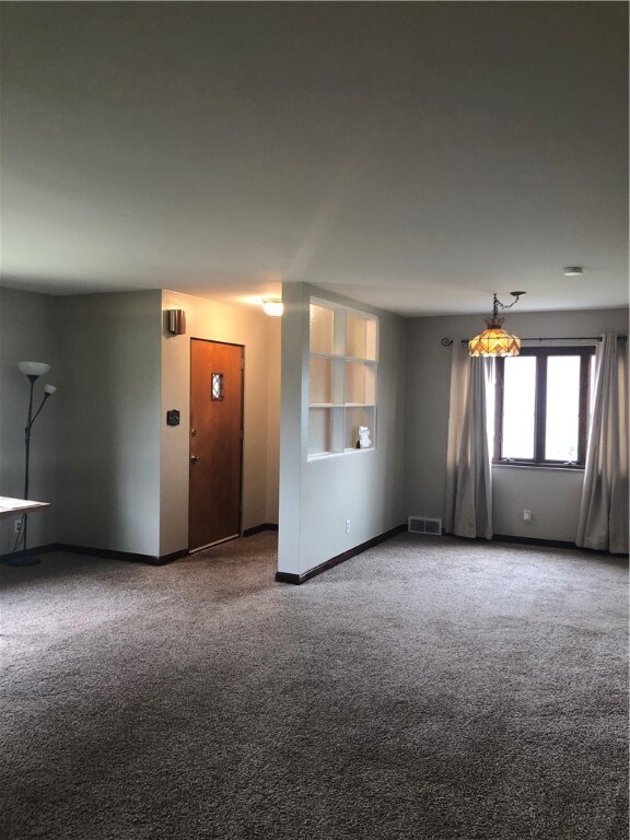 NICE LIVING ROOM,OPEN TO THE DINING ROOM