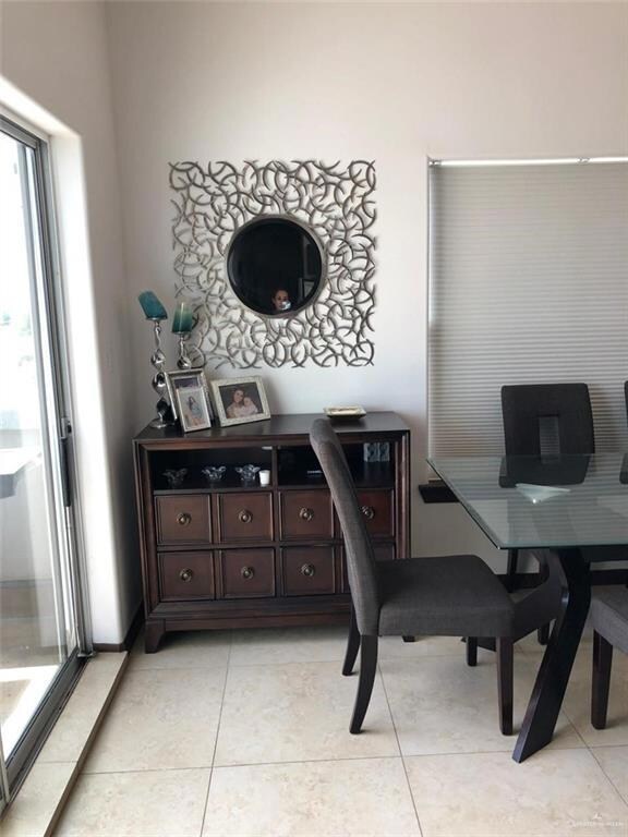 Office area with light tile patterned floors