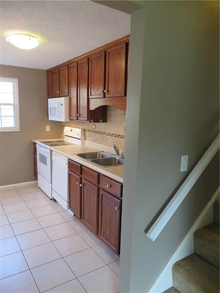 Your View of the Kitchen From the Hallway. There A