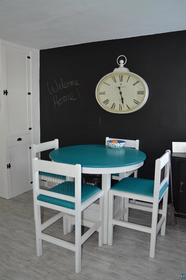 Dining area featuring hardwood / wood-style floori