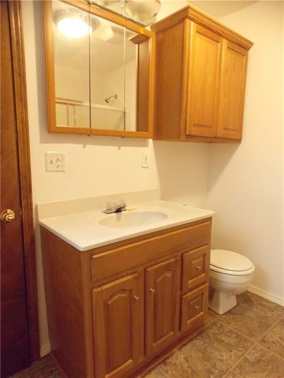 brand new toilet and cabinets!