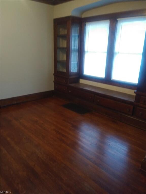The extra large dining room includes storage drawers for linens, leaded glass cabinetry for china and special pieces.  By the way, the window seat is a favorite for potted plants.