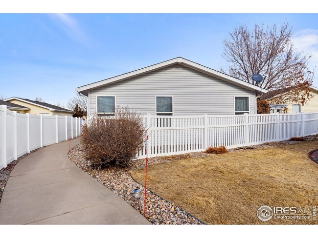 Located next to one of the community's paved walking paths.