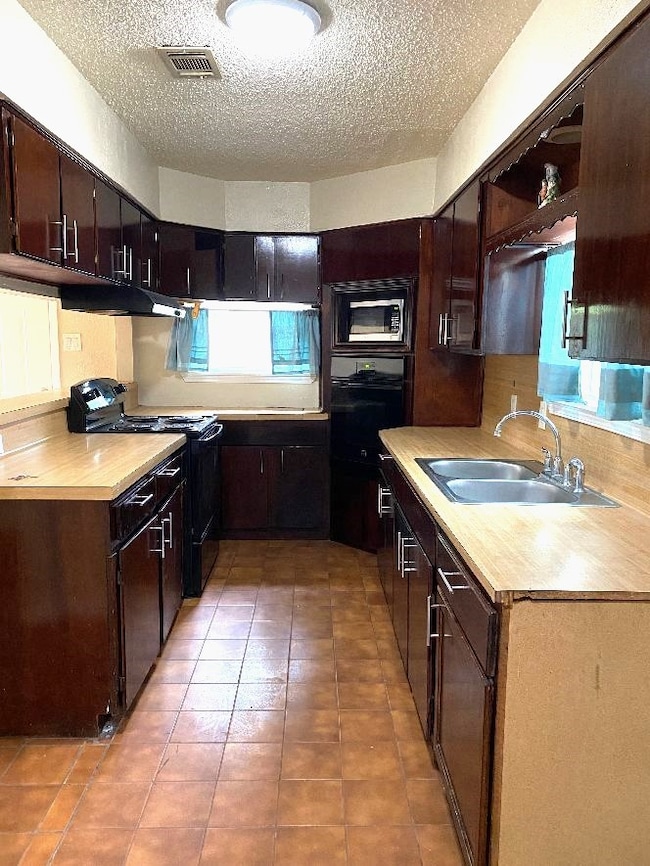 1211 Helms Rd, Houston, TX 77088 - photo 3