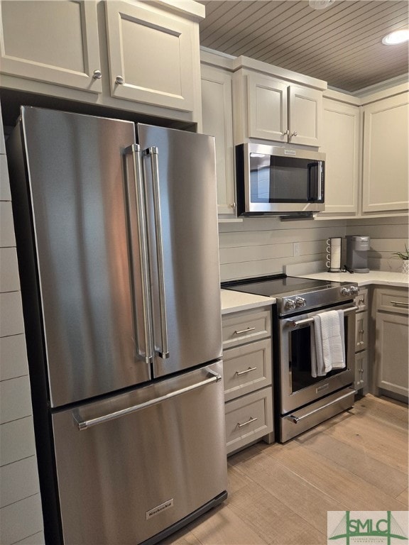 Kitchen, custom cabinets, and stainless appliances