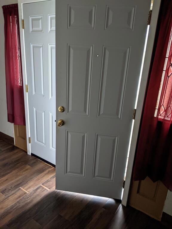 Entry foyer with double doors and double storm doo