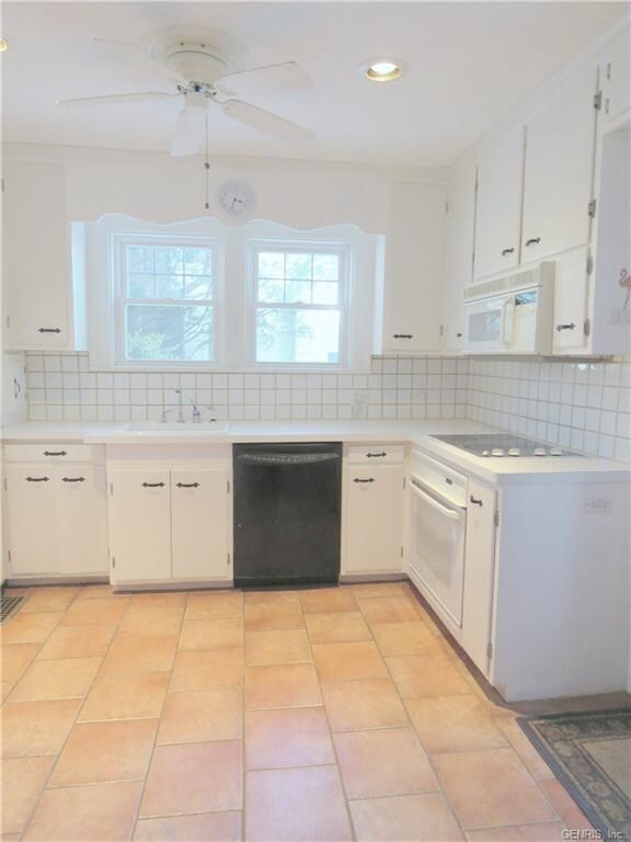 Kitchen with Tile floor & built-in Appliances