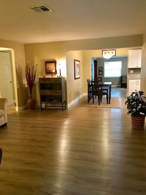 Living room - vinyl wood planking in all the livin