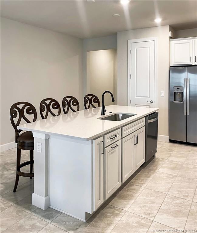 The open concept kitchen island seats four.