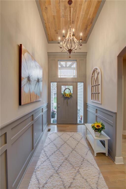 Grand foyer welcomes guests with beautiful ceiling