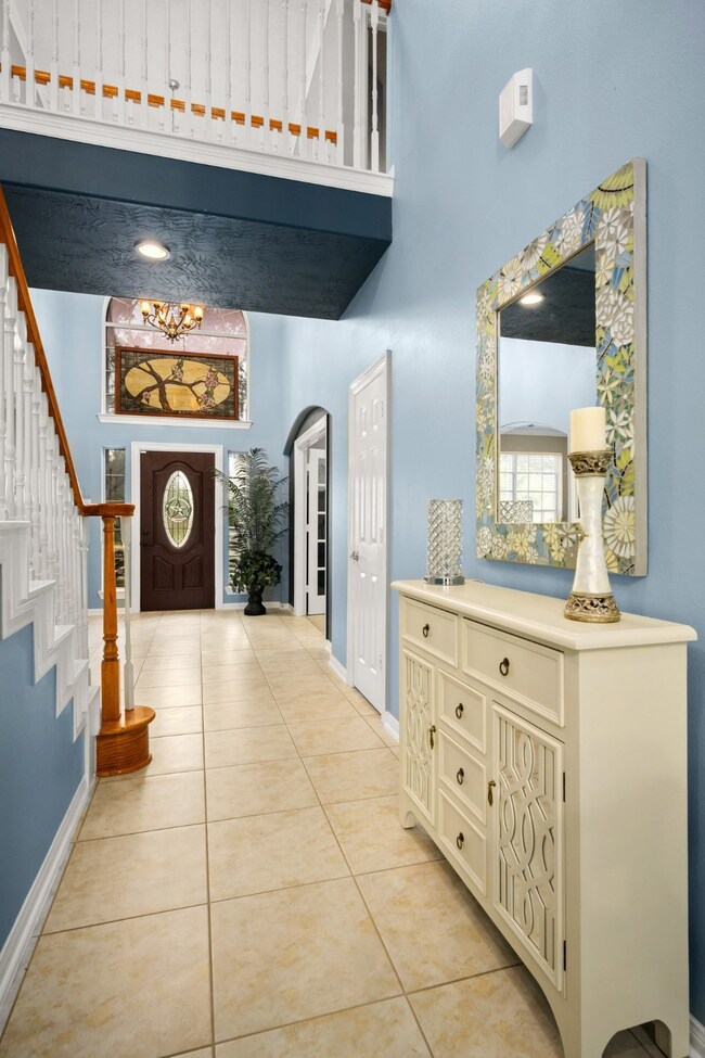 View looking back towards the front entry with study to the right.