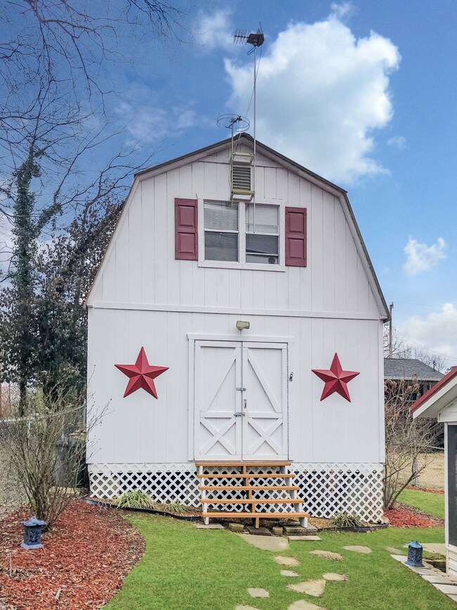 This two-story shed has electric and the second floor has storage.