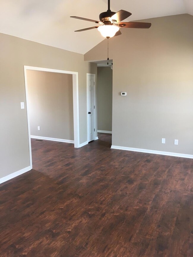 Living room with raised ceiling.