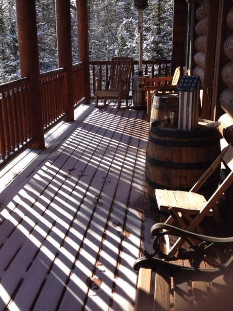 Sit on the upper deck under roof.