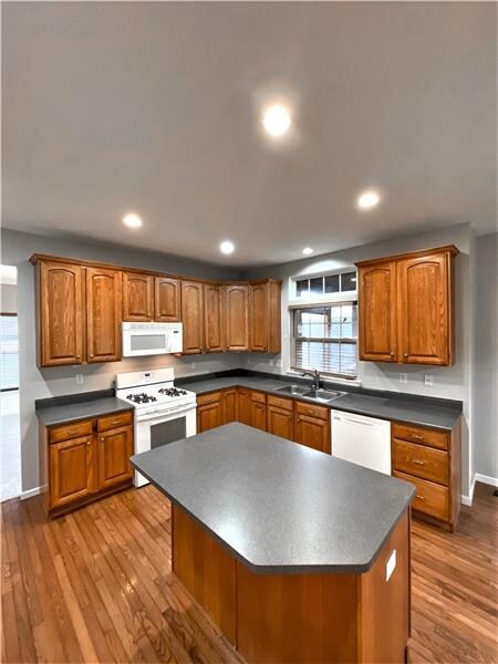 The 21x15 oak kitchen has extensive counter space,