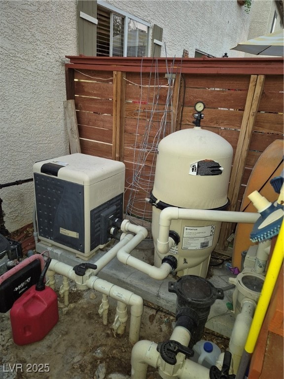 Exterior view of pump and stucco siding