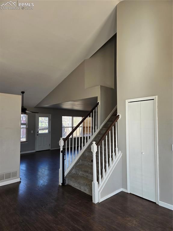 Stairs with ceiling fan, hardwood / wood-style flo