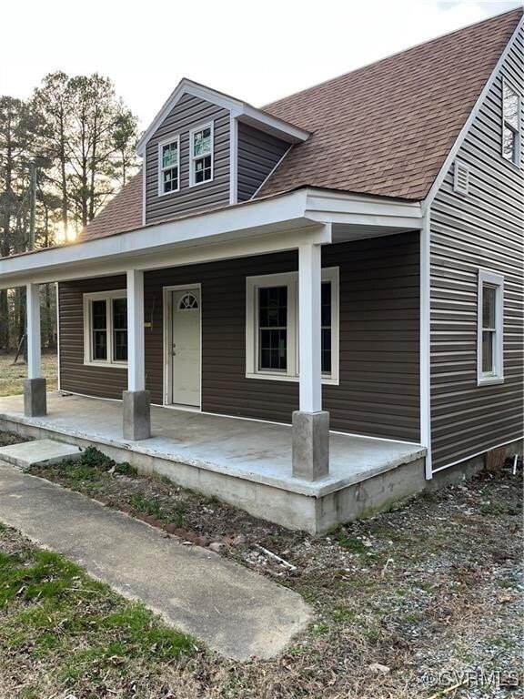 View of front of property featuring a porch