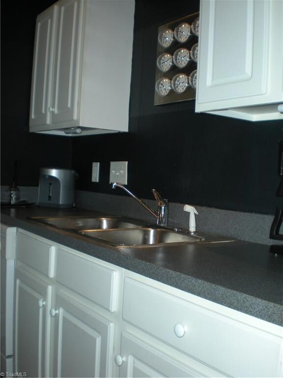 Additional cabinets are the result of a professionally redesigned space.