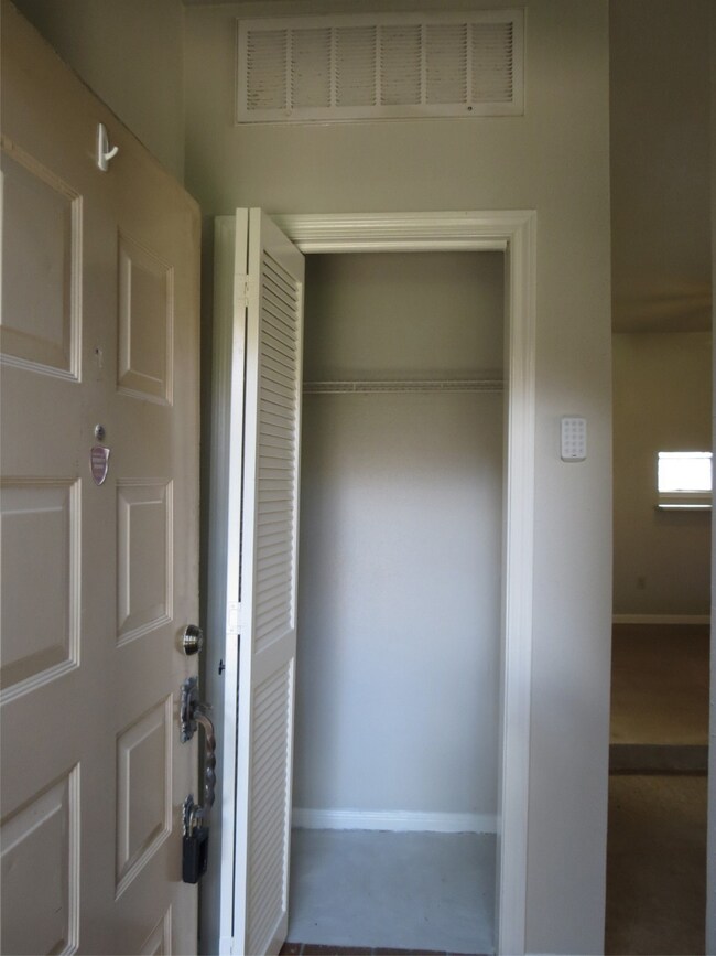 COAT CLOSET OFF FOYER