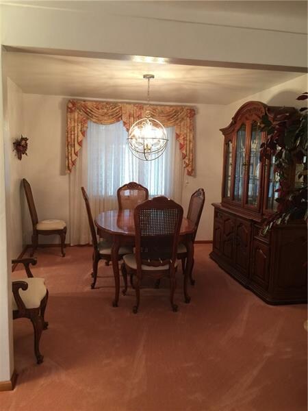Dining room.  Window is open to three seasonal sun