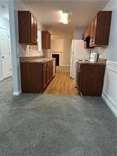 Kitchen with light countertops