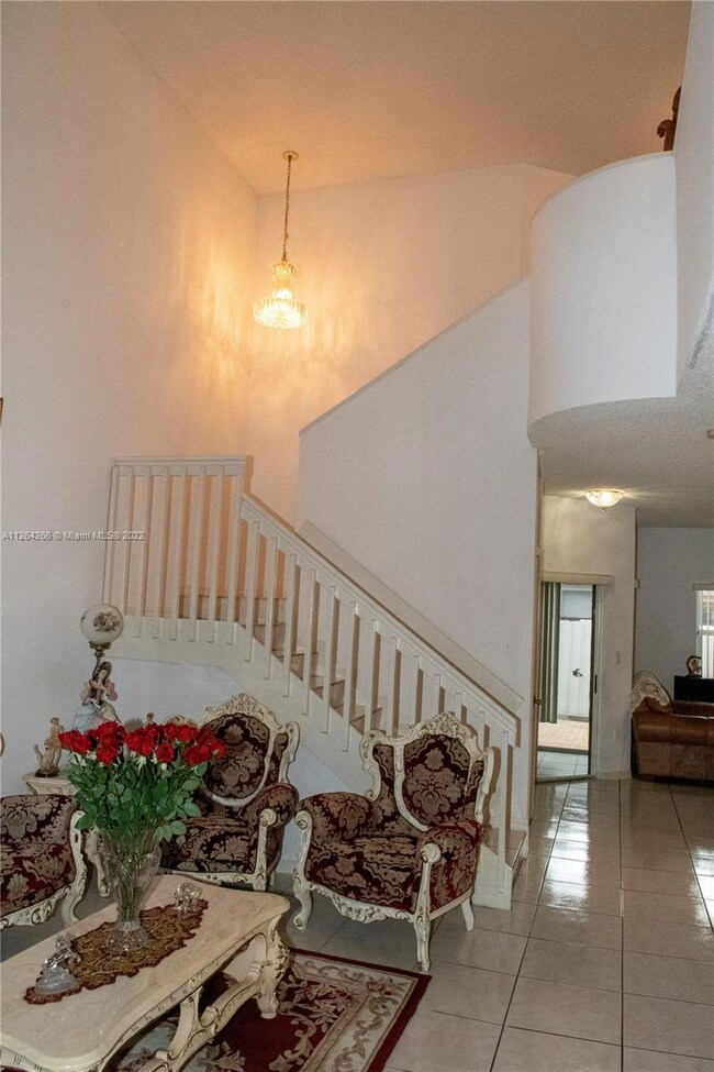 Entrance greeted by beautify high ceilings