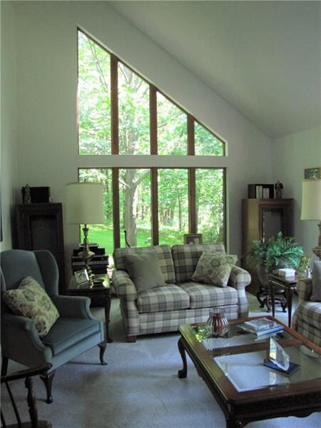 Floor to Ceiling Windows with Vaulted Ceiling in L