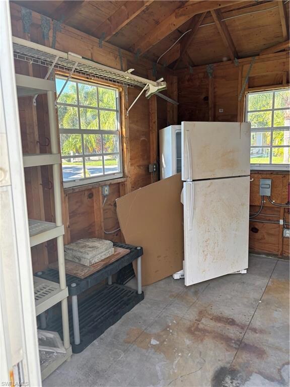 Miscellaneous room with wood walls