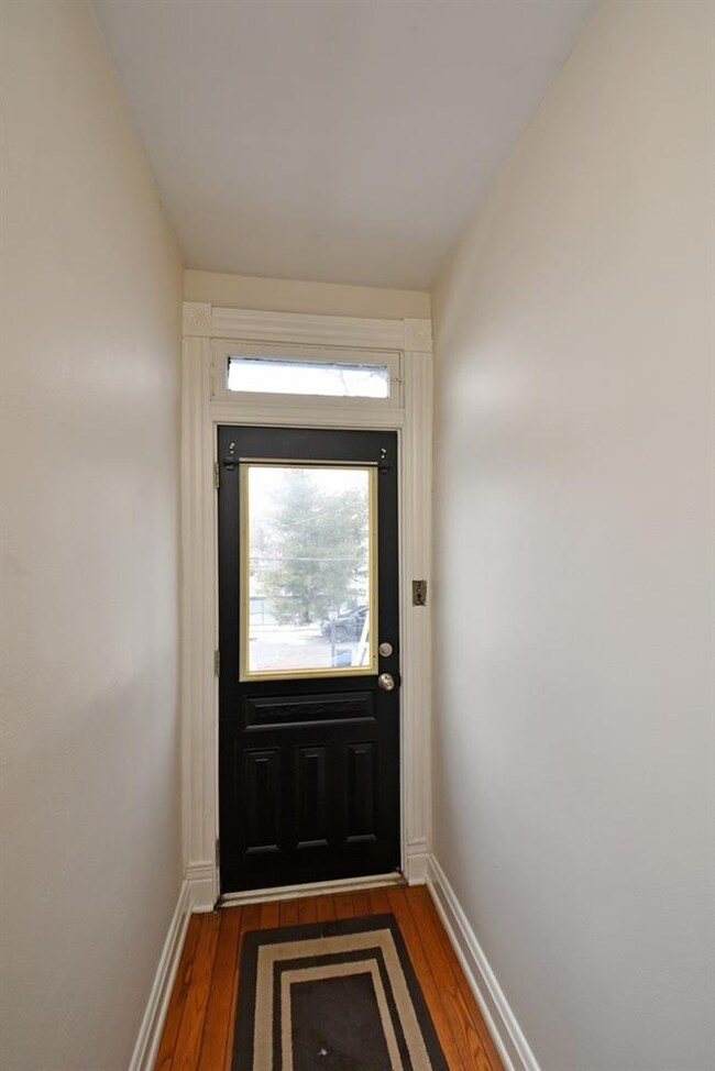The bright entry greets you with hardwood floors.