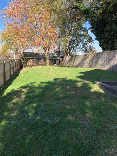 The yard is already fenced in for your kiddos or f