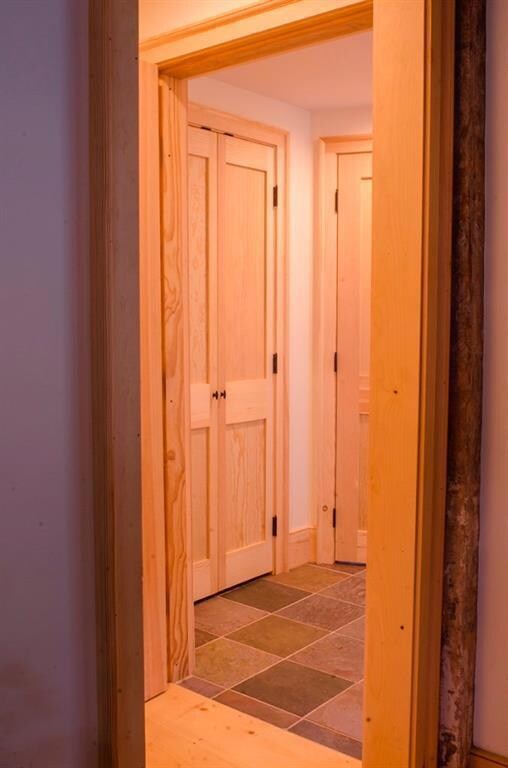 Entry with slate tile and half bath