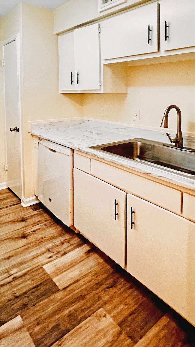 Charming kitchen with elegant farmhouse sink and s