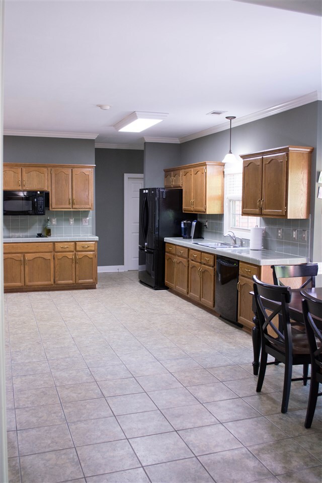 Large Kitchen features a walk in patry