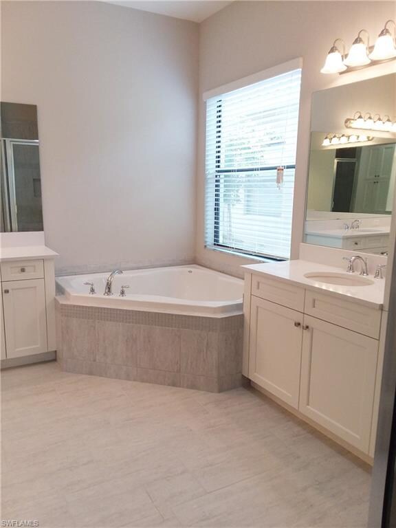 Master Bath with soaker tub and His & Hers sinks, 