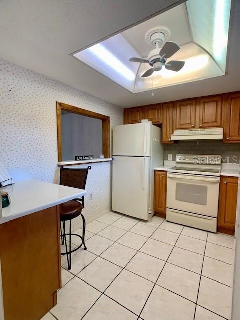 Kitchen with opening to dining area