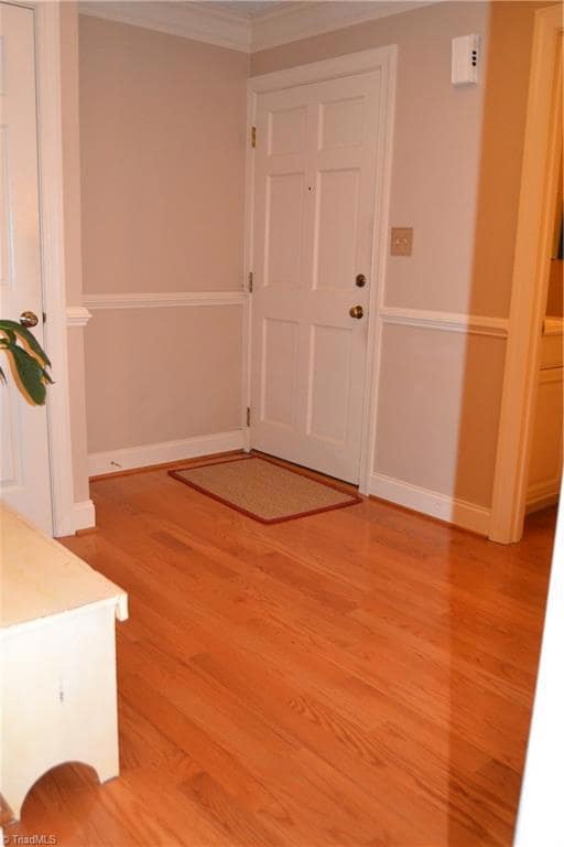 Beautiful wood floor entry to welcome your guest.