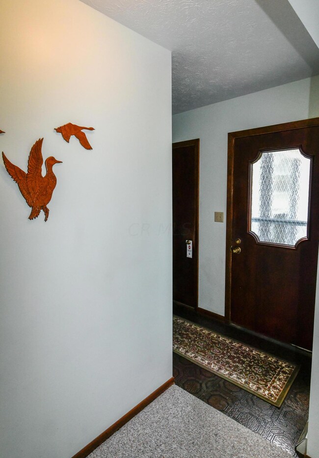 Entry w/Drs. to Basement, Garage