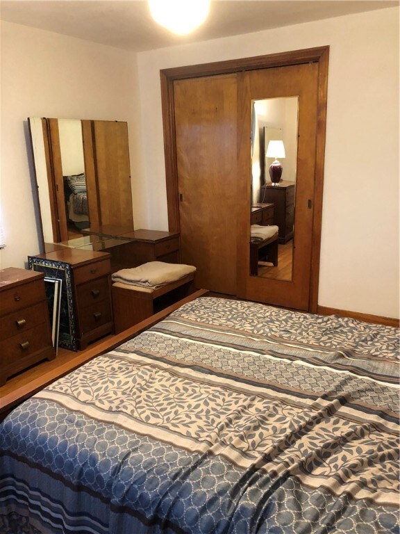 Another view of master bedroom with closet