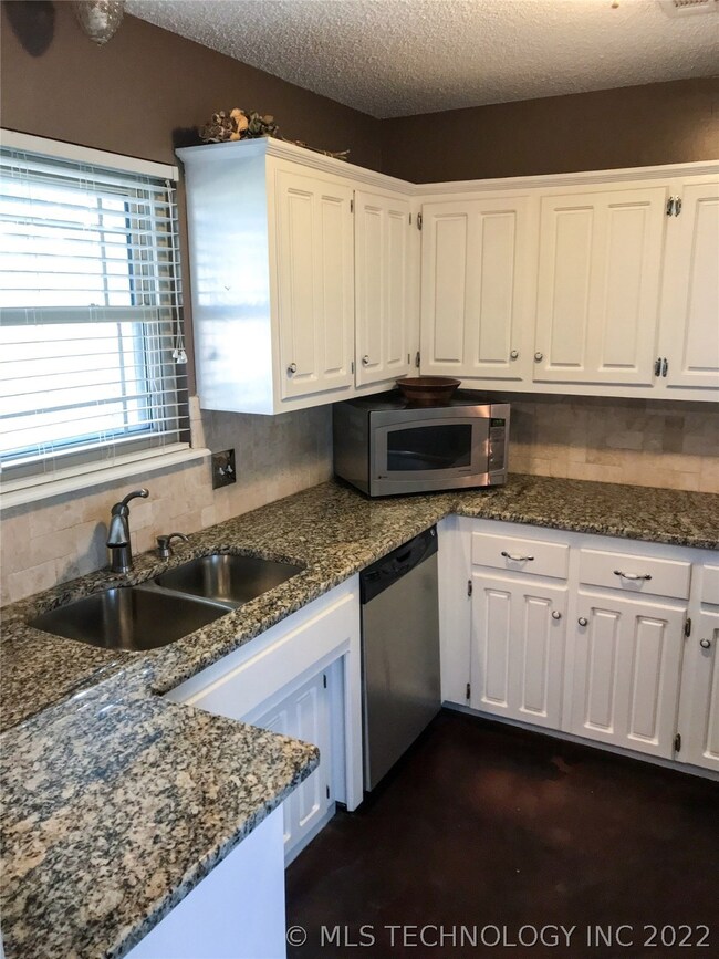 Kitchen with granite counter tops