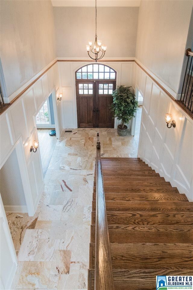 THIS STUNNING FOYER IS IMPRESSIVE AND WILL WOW YOU