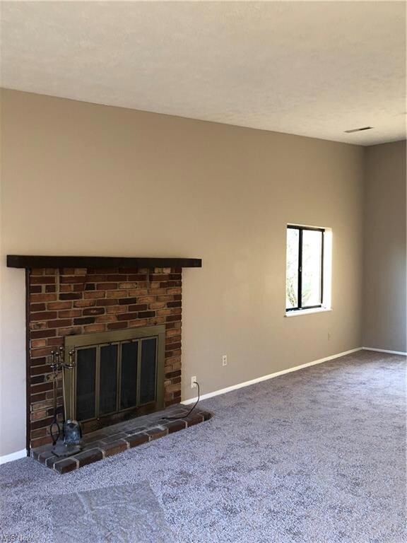 Livingroom With a Brick Fireplace