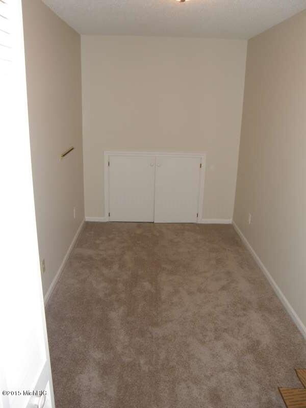 1037 Beechtree Ct unit 36, Norton Shores, MI 49441 - photo 7