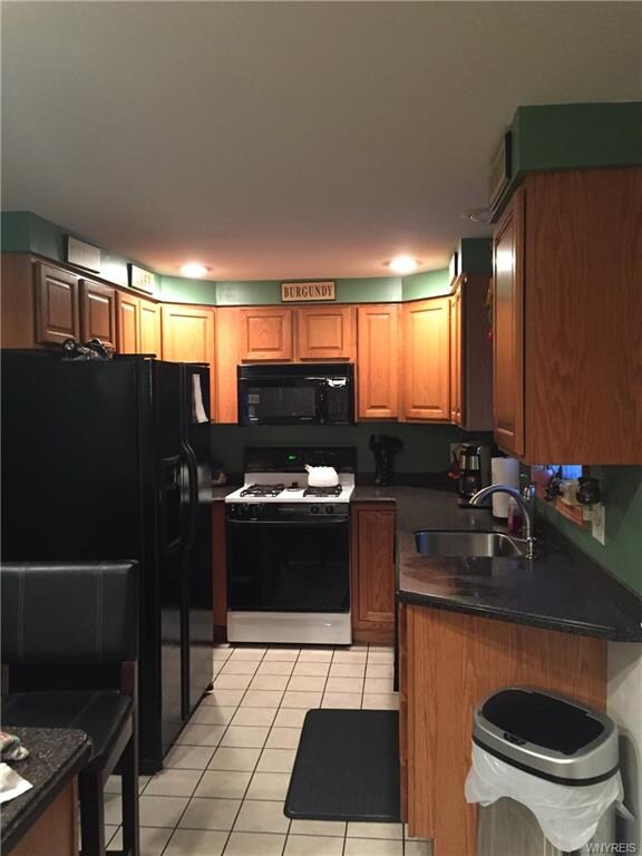 Solid Counter Tops, tile floor, appliances, includ