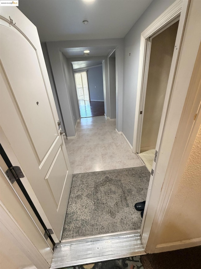 Hallway with baseboards